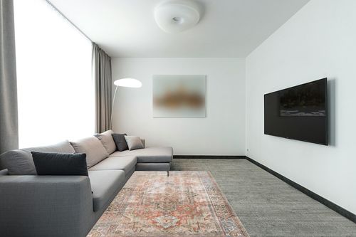Loloi Rugs Loren 5' x 7'6" Hand Knotted Rug in Terracotta and Blue in Modern Living Room with Grey Couch