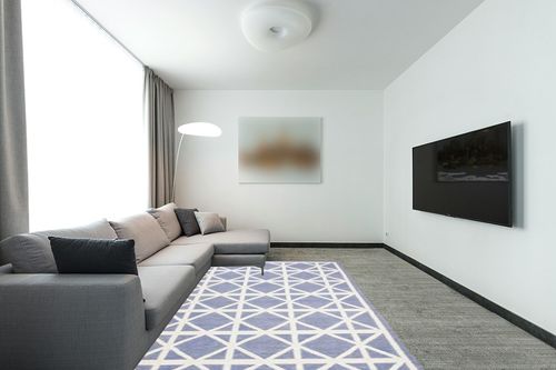 SAFAVIEH Dhurries Collection 6' x 9' Purple / Ivory DHU558B Handmade Flatweave Premium Wool Area Rug in Modern Living Room with Grey Couch