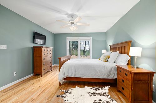 nuLOOM Marcia Machine Washable Faux Cowhide Accent Rug, 3' 10" x 5', Brown in Teal and Orange Wood Bedroom