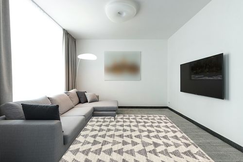 JONATHAN Y MOH206B-8 Aisha Moroccan Triangle Geometric Indoor Farmhouse Area-Rug Bohemian Minimalistic Easy-Cleaning Bedroom Kitchen Living Room Non Shedding, 8 X 10, Cream,Gray in Modern Living Room with Grey Couch