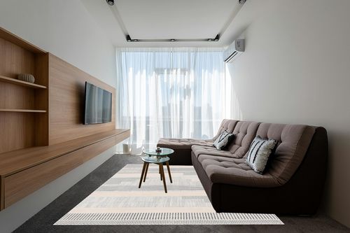 Well Woven Brer Light Blue Abstract Geometric Tribal (7'10" x 9'10") Area Rug in Grey Living Room with Brown Couch