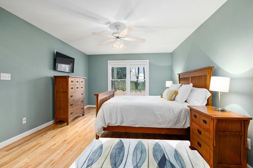 Abbie-Leigh Floral Ivory/Blue Area Rug Latitude Run Rug Size: Rectangle 4' x 6' in Teal and Orange Wood Bedroom
