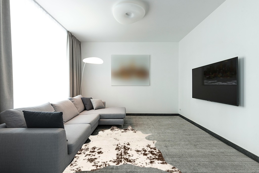 nuLOOM Marcia Machine Washable Faux Cowhide Area Rug, 5' x 6' 7", Brown in Modern Living Room with Grey Couch