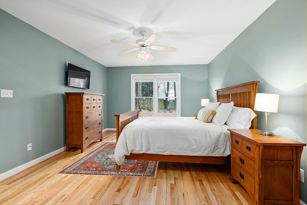 Lahome Boho Tribal Area Rug in Teal and Orange Wood Bedroom