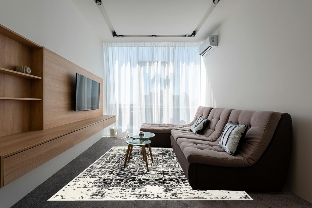 nuLOOM Jordana Vintage Distressed Medallion Area Rug, 8x10, Black and White in Grey Living Room with Brown Couch