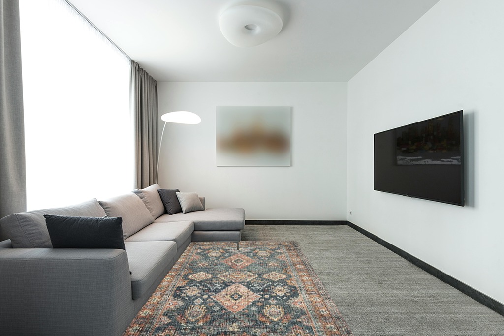 Loloi II Skye Collection SKY-10 SEA / RUST, Traditional 5'-0" x 7'-6" Area Rug in Modern Living Room with Grey Couch
