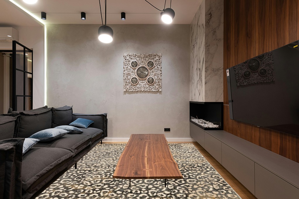 Liora Manne Soho Leopard Indoor Rug Black 7'10"X9'10" in Dark Wood Living Room with Black Couch