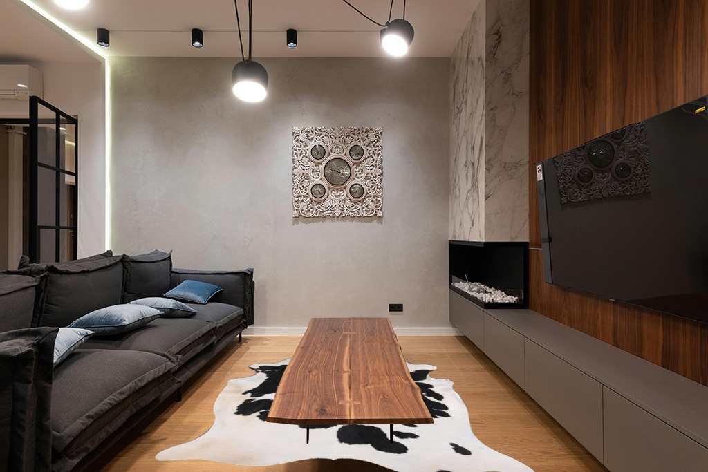Home Must Haves Cowhide Rug, 6' x 7', Black and White in Dark Wood Living Room with Black Couch