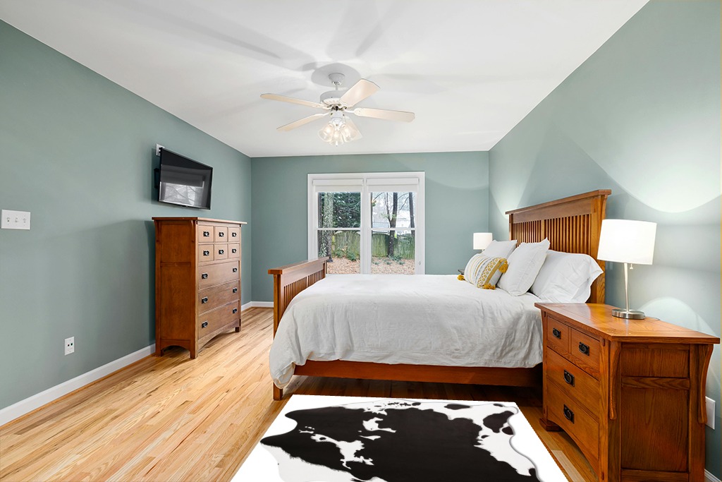MACEVIA Faux Cowhide Rug Cute Cow Print Rug Animal Area Carpet Western Decor for Living Room Bedroom Non-Slip 59" L x 47.2" W(4.9ft x 3.9ft) Black and White in Teal and Orange Wood Bedroom