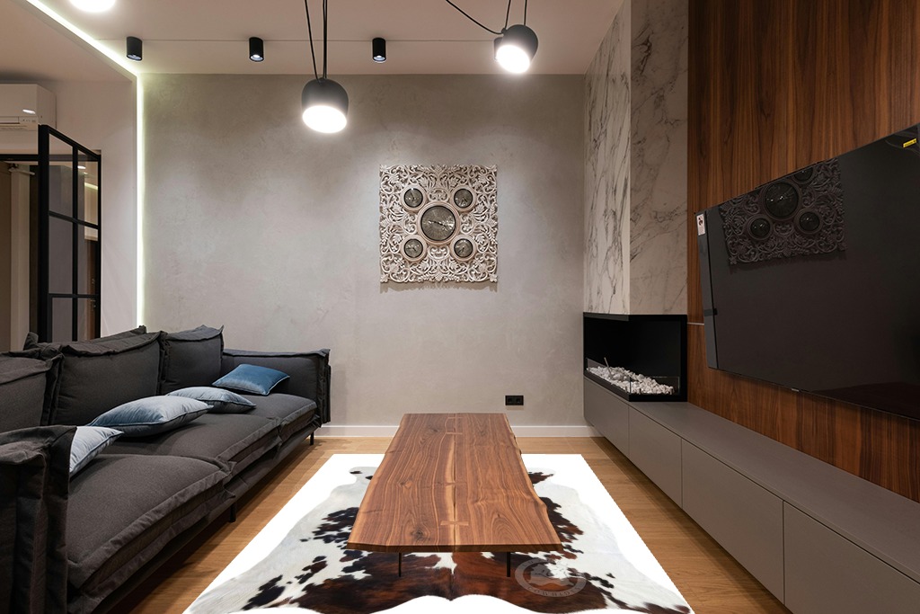 Sunshine Cowhides Genuine Tricolor Cowhide Rug - Luxurious Cow Rug for Bedroom, Living Room, and Home Decor Enthusiasts - Masterpiece of Style and Functionality - 6x6-7ft (180x210cm) in Dark Wood Living Room with Black Couch