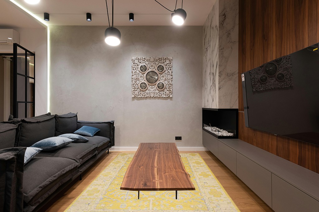 SAFAVIEH Stone Wash Collection 6' x 9' Yellow STW213A Hand-Knotted Premium Wool & Viscose Area Rug in Dark Wood Living Room with Black Couch