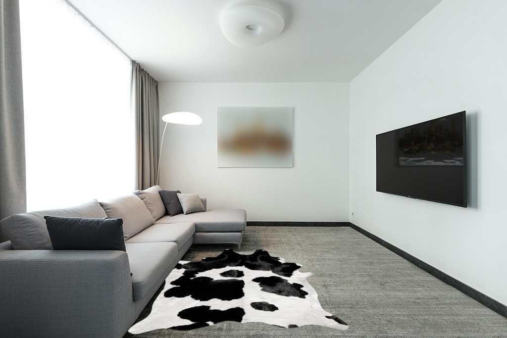 A-STAR Black and White Cowhide Area Rug Premium Quality Natural Cow Skin Leather Rug for Living Room Décor 5ft x 6ft (60Inch x 72Inch, 152.4CM x 182.88CM) X-Large in Modern Living Room with Grey Couch