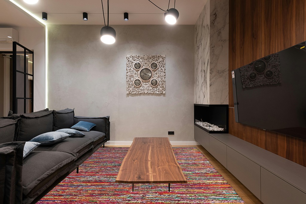 Cotton Multi Chindi Hand Woven Rugs THE BEER VALLEY in Dark Wood Living Room with Black Couch