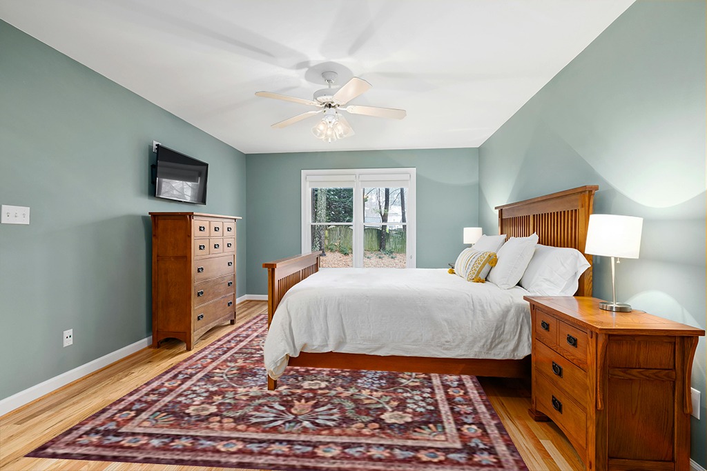 Loloi Rifle Paper Co. Maison Collection MAO-06 Red 8'-4" x 11'-6", .19" Pile Height, Area Rug in Teal and Orange Wood Bedroom