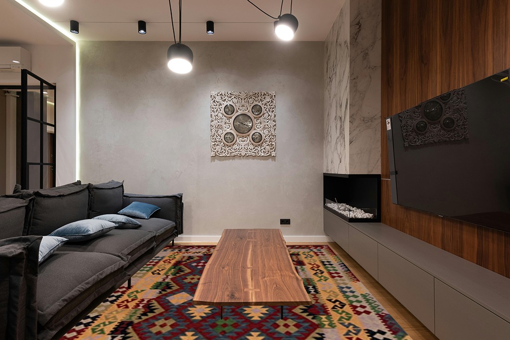 SAFAVIEH Aspen Collection Area Rug - 8' x 10', Red & Yellow, Handmade Boho Tribal Southwestern Wool, Ideal for High Traffic Areas in Living Room, Bedroom (APN404Q) in Dark Wood Living Room with Black Couch