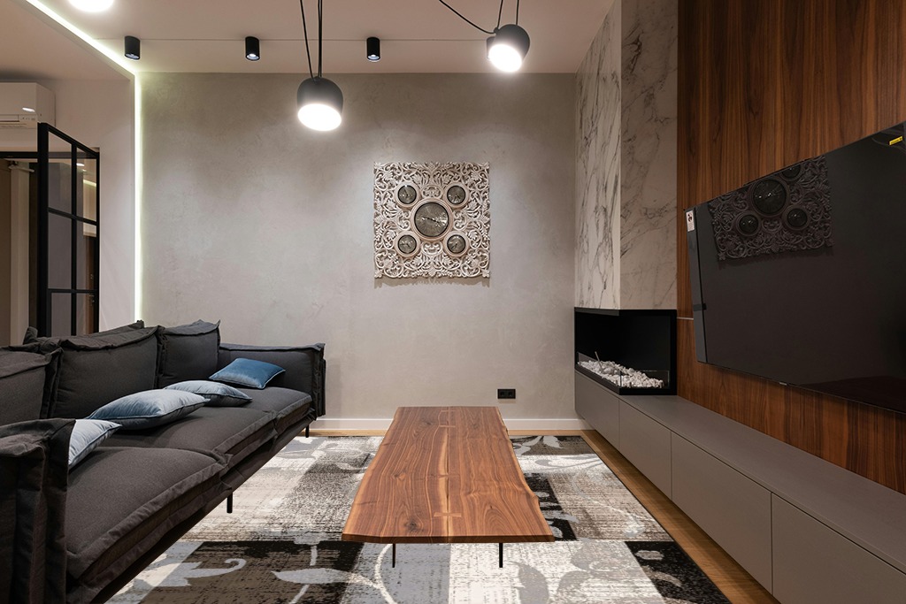 Indoor Area Rug with Jute Backing 8' X 10' in Dark Wood Living Room with Black Couch
