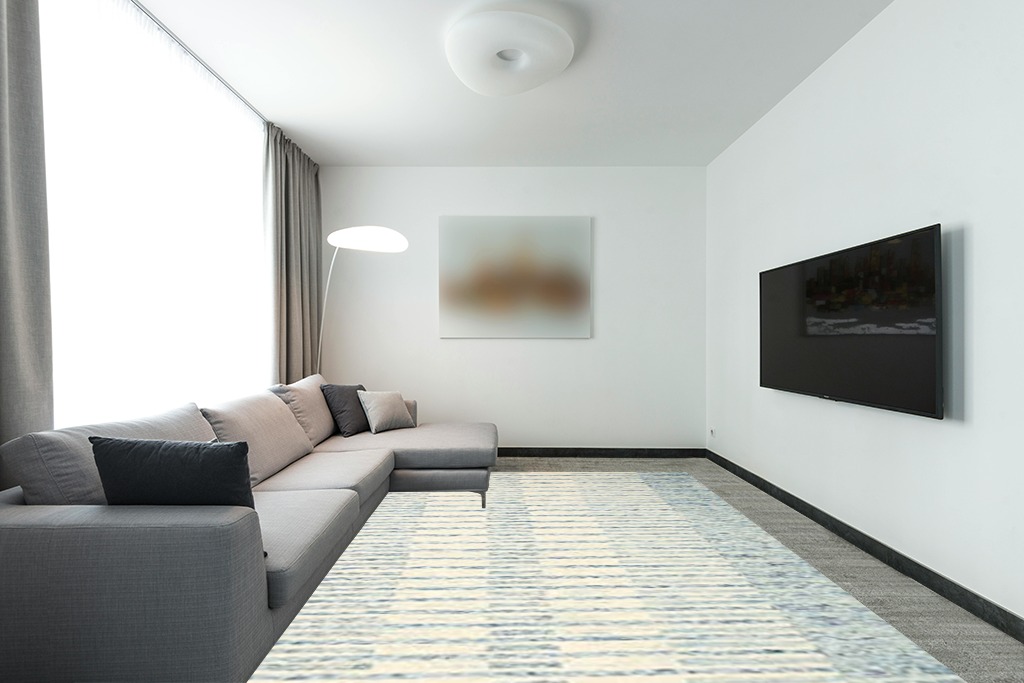 Loloi Chris Loves Julia x Chris Ivory/Denim 8'-6" x 11'-6" Area Rug in Modern Living Room with Grey Couch