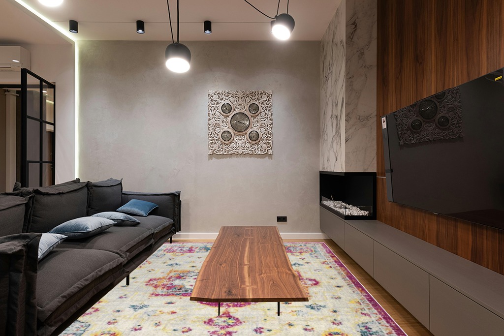 Antep Rugs Elite 8x10 Vintage Bohemian Distressed Oriental Medallion Indoor Area Rug (Pink, 7'10" x 10') in Dark Wood Living Room with Black Couch