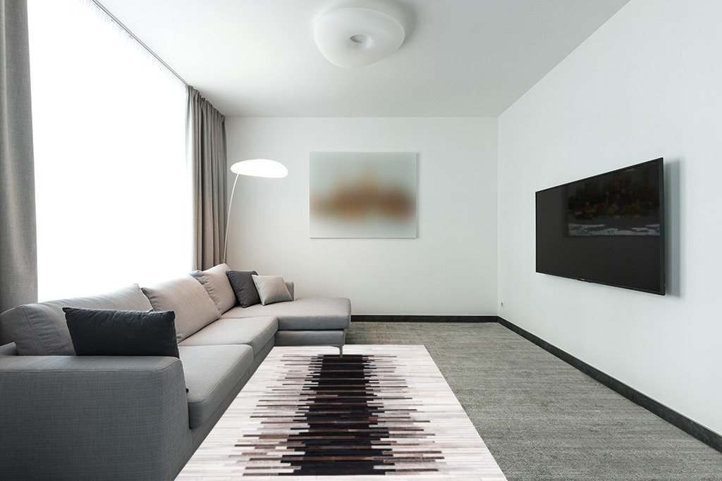 Safavieh Studio Leather Collection Area Rug - 5' x 8', Grey & Brown, Handmade Modern Natural Hide, Ideal for High Traffic Areas in Living Room, Bedroom (STL818F) in Modern Living Room with Grey Couch