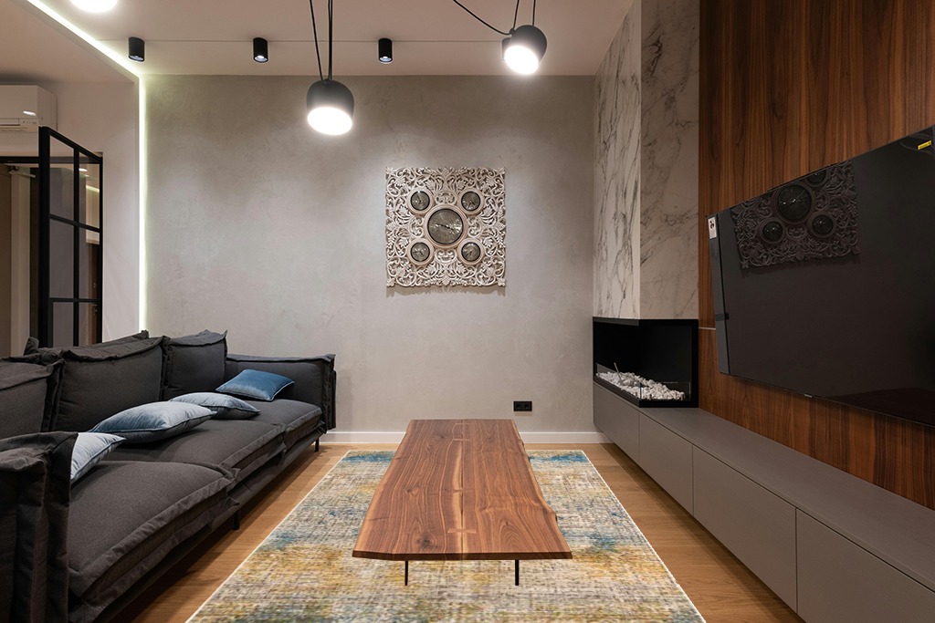 Unique Loom Deepa Collection Area Rug - Whane (Rectangular 6' 0" x 8' 9", Blue Ivory/ Yellow) in Dark Wood Living Room with Black Couch