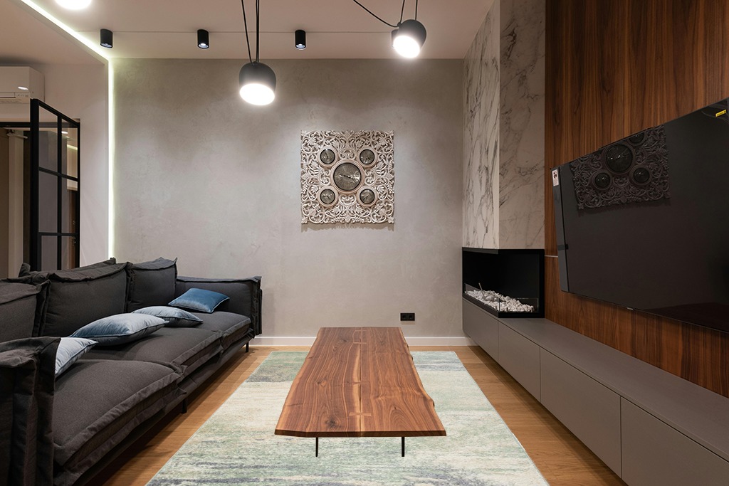 SAFAVIEH Adirondack Collection Area Rug - 6' x 9', Ivory & Sage, Modern Abstract Design, Non-Shedding & Easy Care, Ideal for High Traffic Areas in Living Room, Bedroom (ADR112W) in Dark Wood Living Room with Black Couch