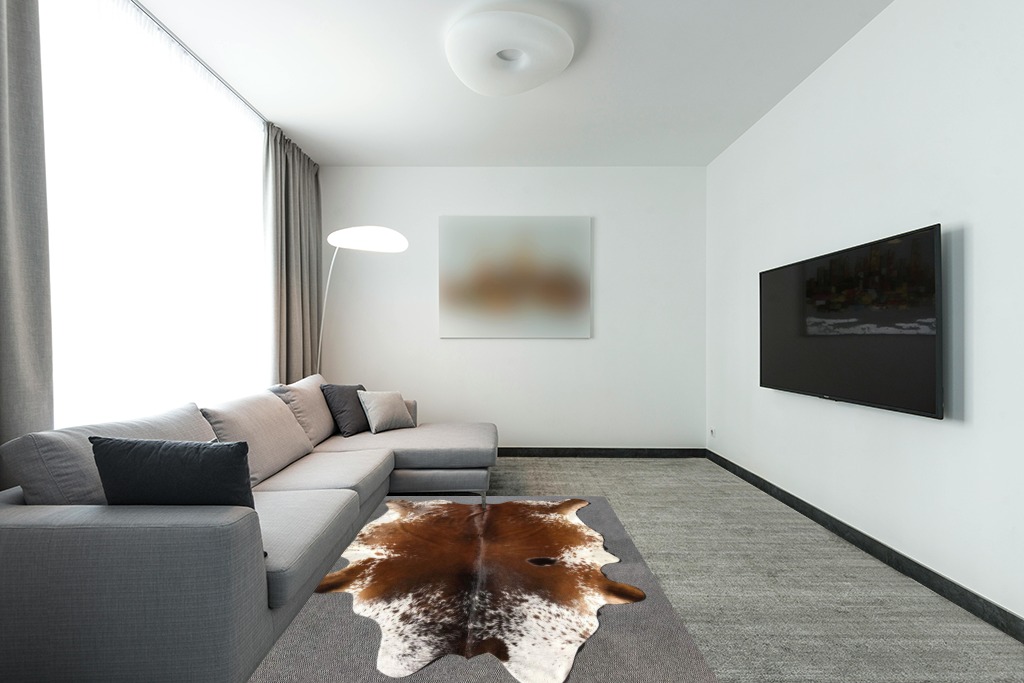 Large Cowhide Rug Tricolor Cowhide Cow Skin Leather Area Rug, Hair On Cow Hide Rugs 5 X 7 ft Black, Brown and White in Modern Living Room with Grey Couch