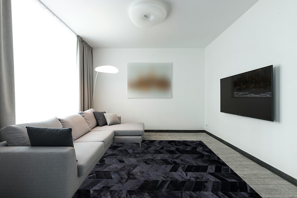 New Cowhide Rug Leather. Animal Skin Patchwork Area Carpet (8 X 10) in Modern Living Room with Grey Couch