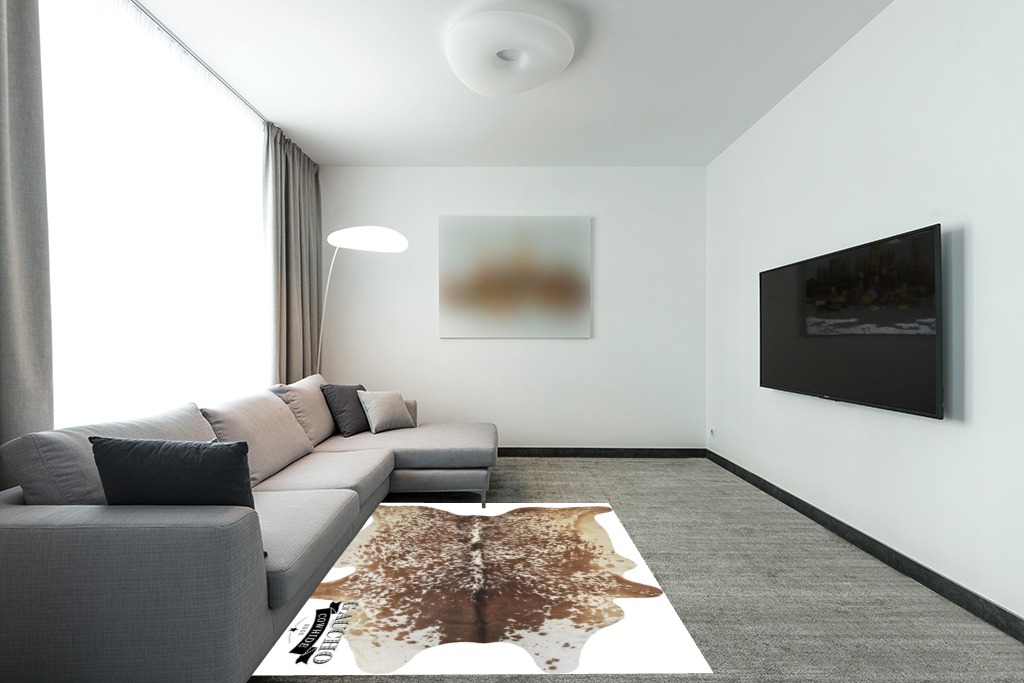 Gaucho Cowhides Natural Snowie Brown and White in Modern Living Room with Grey Couch