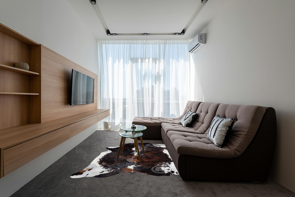 Sunshine Cowhides Genuine Brindle Dark Tricolor Cowhide Rug - Luxurious Cow Rug for Bedroom, Living Room, and Home Decor Enthusiasts - Masterpiece of Style and Functionality - 6x6-7ft (180x210cm) in Grey Living Room with Brown Couch