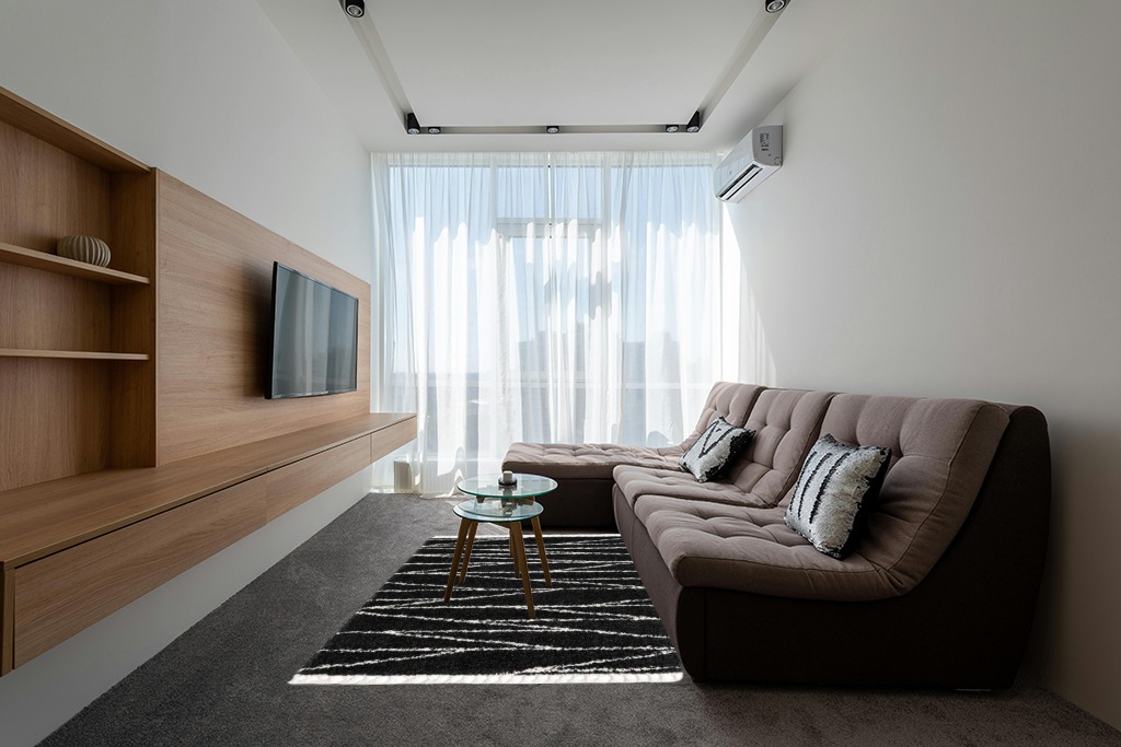 Abrahams Geometric Black/White Area Rug Hashtag Home Rug Size: Rectangle 5'3" x 8' in Grey Living Room with Brown Couch