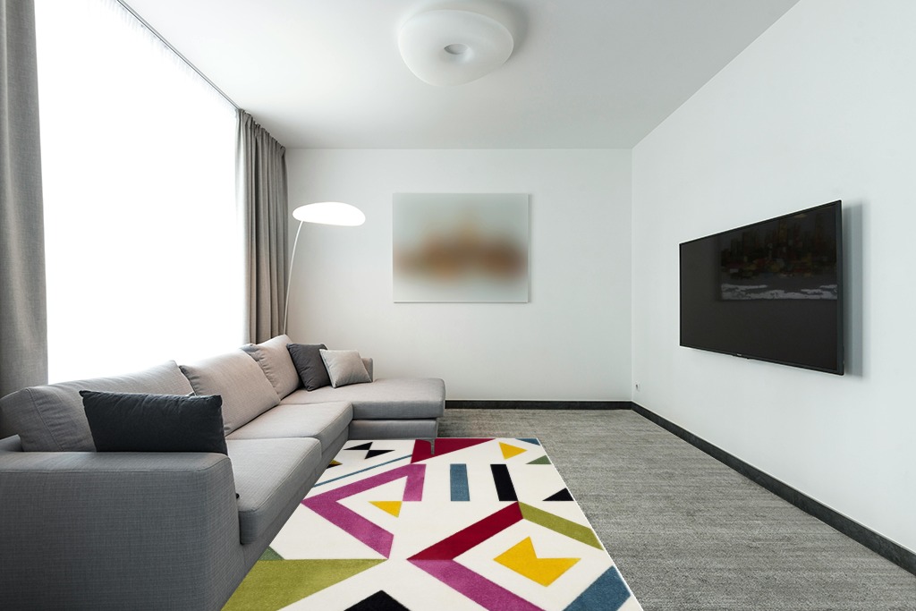 SAFAVIEH Hollywood Collection Area Rug - 5'3" x 7'6", Ivory & Rose, Mid-Century Modern Design, Non-Shedding & Easy Care, Ideal for High Traffic Areas in Living Room, Bedroom (HLW700A) in Modern Living Room with Grey Couch