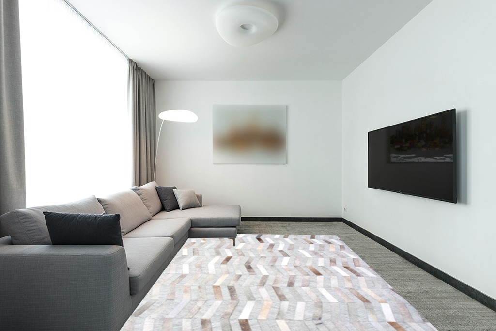 nuLOOM Cece Contemporary Cowhide Area Rug, 8x10, Silver in Modern Living Room with Grey Couch